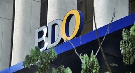 DOJ indicts 4 in BDO bank fraud probe .
